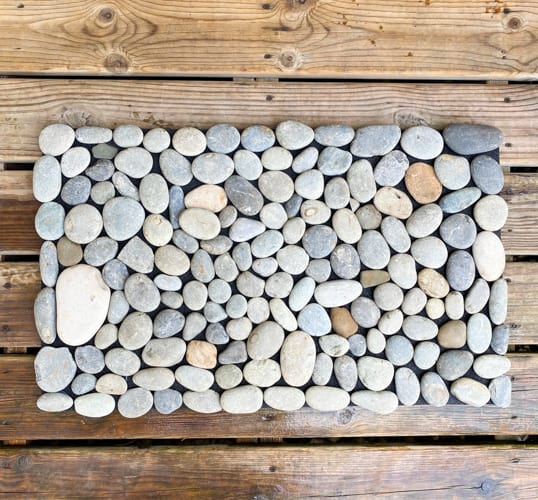 Learn how to create a DIY rock mat for your home spa. This easy tutorial shows you how to bring a luxurious, tranquil touch to your self-care routine.