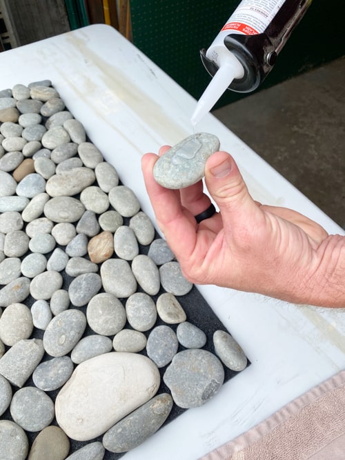 Learn how to create a DIY rock mat for your home spa. This easy tutorial shows you how to bring a luxurious, tranquil touch to your self-care routine.