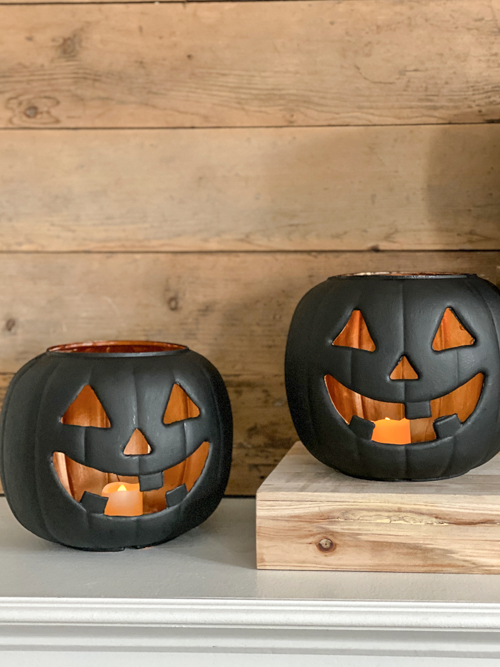 Create stylish Halloween decor with DIY Pottery Barn Jack-O-Lantern dupe. Get the high-end look for less than $5 using plastic pails, paint, and LED candles.