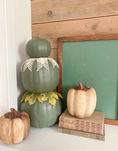 Learn how to make a DIY Pumpkin Topiary with paper mache and foam pumpkins, paint, and hot glue. This easy tutorial will add a festive touch to your fall decor!