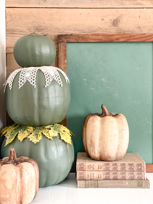 Learn how to make a DIY Pumpkin Topiary with paper mache and foam pumpkins, paint, and hot glue. This easy tutorial will add a festive touch to your fall decor!