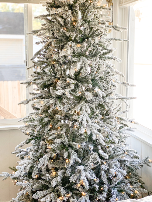 In this King of Christmas Flocked Tree Review, discover why the 7.5' Queen Flock® Slim Artificial Tree is the perfect holiday centerpiece for your home.