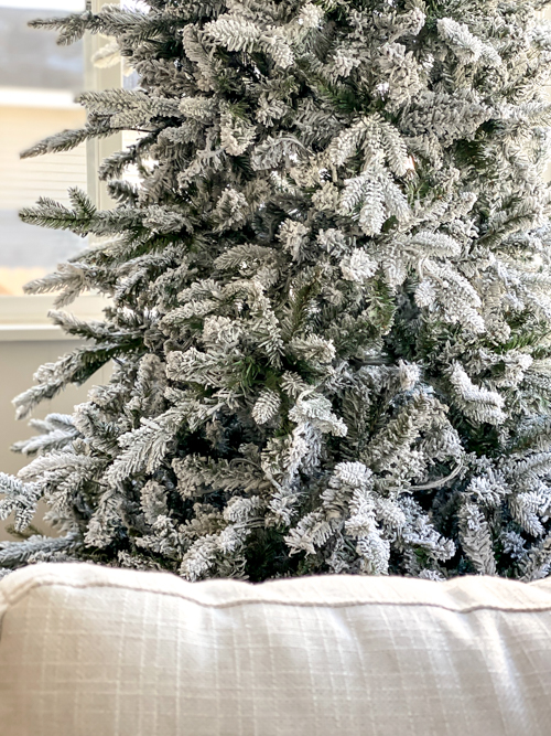 In this King of Christmas Flocked Tree Review, discover why the 7.5' Queen Flock® Slim Artificial Tree is the perfect holiday centerpiece for your home.