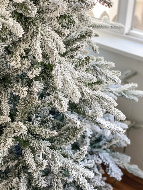 In this King of Christmas Flocked Tree Review, discover why the 7.5' Queen Flock® Slim Artificial Tree is the perfect holiday centerpiece for your home.