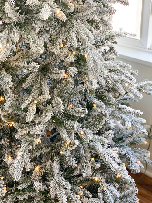 In this King of Christmas Flocked Tree Review, discover why the 7.5' Queen Flock® Slim Artificial Tree is the perfect holiday centerpiece for your home.