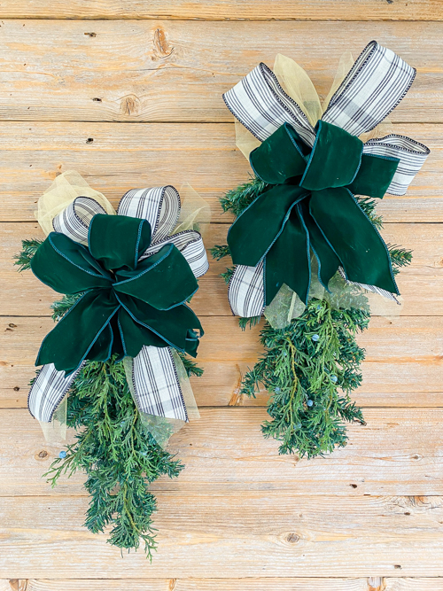 How to make DIY Dollar Store Christmas Swags for only $2.50 using supplies like 18" trees, floral wire, and ribbon. Perfect for budget-friendly holiday decor!