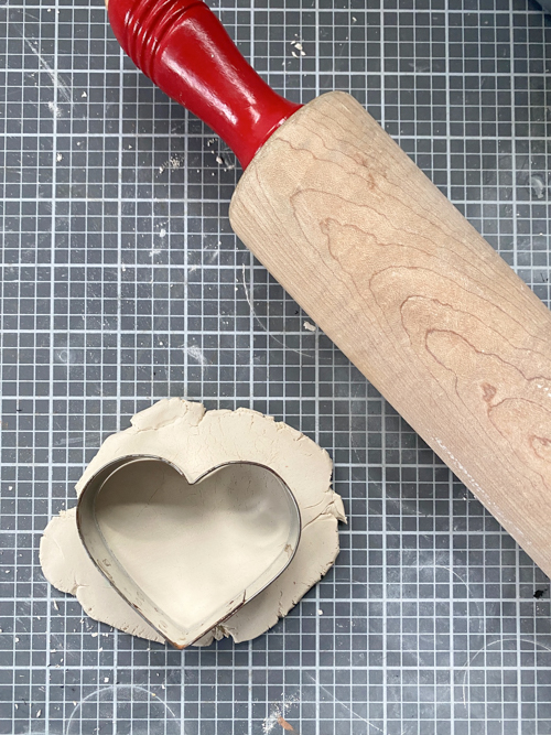 Create a charming DIY Heart Garland using air dry clay, book pages, and stain. This easy craft adds a vintage touch to your home decor for any season.