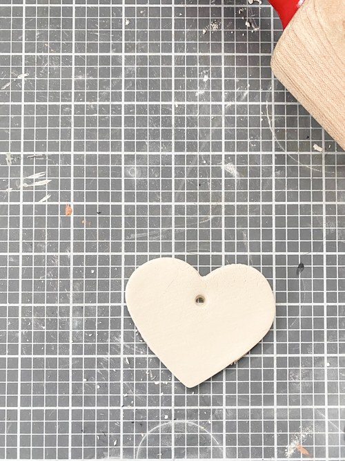 Create a charming DIY Heart Garland using air dry clay, book pages, and stain. This easy craft adds a vintage touch to your home decor for any season.