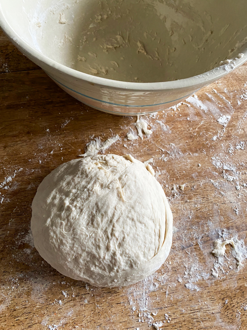 Learn how to make this Dutch Oven Bread Recipe with just 4 ingredients! A simple, delicious bread baked to perfection with a crispy crust and soft interior.