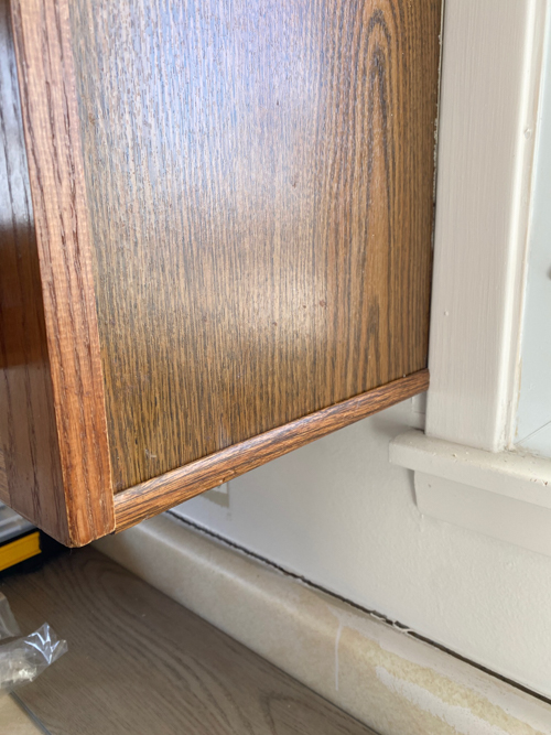 Fix chipping cabinet edges with trim for a quick, budget-friendly update. Learn how this easy DIY can save you thousands and refresh your kitchen cabinets.