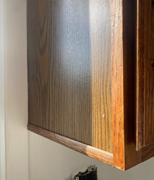 Fix chipping cabinet edges with trim for a quick, budget-friendly update. Learn how this easy DIY can save you thousands and refresh your kitchen cabinets.